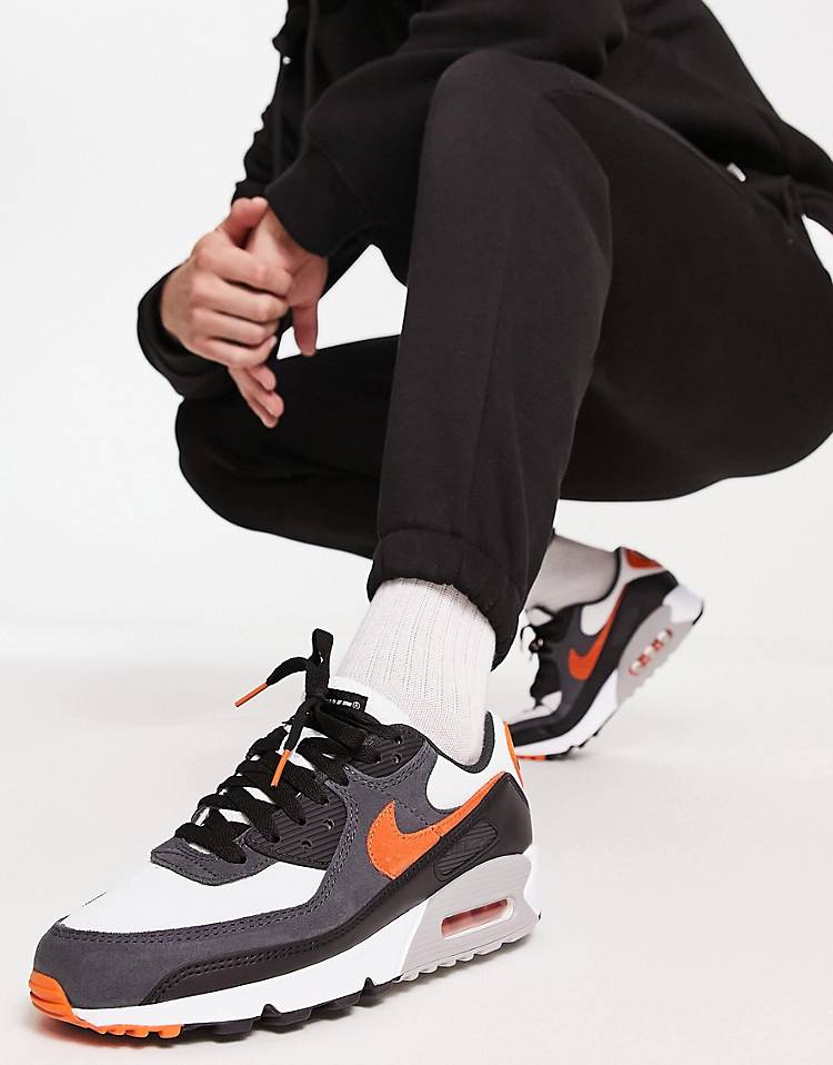 Nike air max 90 sneakers in black and orange